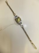 A Lanco ladies cocktail watch with 9 carat white gold strap