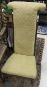 A Victorian prie a Dieu chair upholstered in pale yellow diamond patterned upholstery