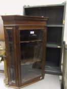A Victorian mahogany glazed wall hanging three tier corner display cabinet, together with a
