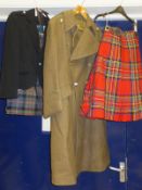 Two kilts, one bearing a MacDougalls label, the other Geoffrey (Tailor) Highland Crafts Royal Mile
