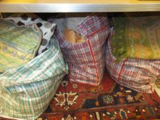 Six bags of assorted scatter cushions, curtains, etc