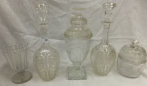 Two cut glass decanters with star cut bases, three sweetmeat dishes and six brandy balloons