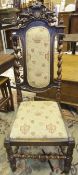 A pair of 19th Century stained beech hall chairs in the Carolean manner