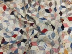 A 20th Century patchwork quilt of cubed design, together with a cotton nightdress