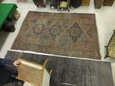 A Caucasian Kelim / flat woven carpet, the central blue, terracotta and orange medallion