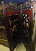 A Japanese Meiji period shibyama ware two fold screen decorated with eagle amongst maple leaves