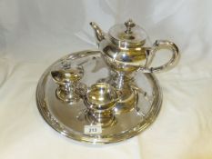 A German white metal teapot stamped "830" to base, together with lidded sugar pot and spoon and