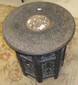 A late 19th Century circular Syrian carved hardwood occasional table with mother of pearl inlay