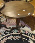 A late 18th / early 19th Century oak circular occasional table on turned and ringed pedestal to
