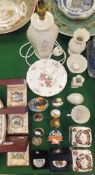 A collection of Belleek china to include a table lamp base, egg shaped trinket dish, mug