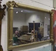 A circa 1900 gilt framed overmantel mirror with column and acanthus decoration