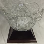 A 19th Century cut glass punch bowl on hardwood stand