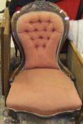 A Victorian mahogany framed salon chair with pink ground upholstery