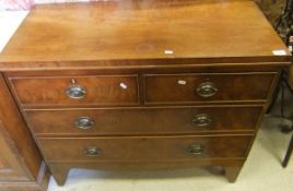 A 19th Century mahogany chest of two short and two long drawers on bracket feet