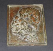 A 19th Century bronze plaque depicting Christ modelled in relief, 25.5 cm x 19.25 cm.