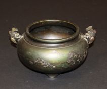 A Japanese bronze censer relief moulded with landscape and Mount Fuji in the distance, with silver