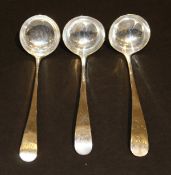 A pair of George III Scottish silver Old English pattern sauce ladles (by Alex Edmundson III, ,