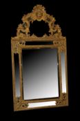 A 19th Century Continental (possibly Venetian) carved giltwood and gesso framed wall mirror with