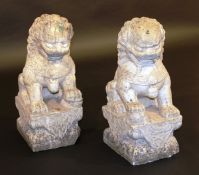 A pair of 19th century Chinese carved marble temple lion figures, 50 cm high.   CONDITION REPORTS