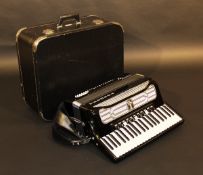 A Vermona "Supita" accordion, in case.   CONDITION REPORTS  General wear and scuffs.  Some of the