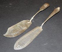 A George III silver Fiddle pattern fish slice with shaped blade and pierced grille (by Steven
