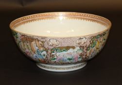 A Chinese Qianlong export punch bowl, the centre field decorated with floral spray within a