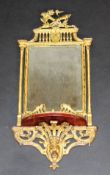 A 19th Century Continental gilt metal girandole, the rectangular mirror plate with galleried and