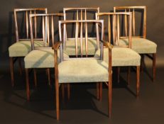 A set of six stained beech framed dining chairs by Ian Audsley in the Arts & Crafts manner, the