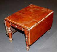 A Victorian mahogany miniature drop leaf dining table, the rounded rectangular top with moulded edge