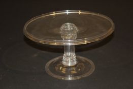 A 19th century glass tazza raised on faceted baluster stem to turned foot, 29.8 cm diameter x 16.2