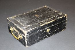 A Victorian leather covered diplomatic document box bearing "VR" cypher and crown to top, and