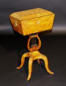 A 19th Century Continental satinwood teapoy of sarcophagus form, the lid opening to reveal a basic