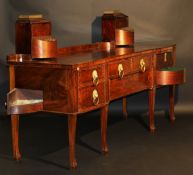 A Regency mahogany breakfront sideboard, the top with two revolving knife boxes surmounted by