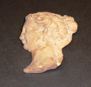 A 19th Century carved Sienna marble bust of Venus in profile, 10.5 cm x 8.5 cm.