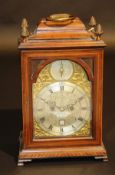 A 19th Century mahogany and inlaid mantel clock, the eight day twin fusée movement with brass arched