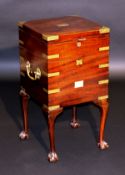 A mahogany and brass bound wine cooler in the George III taste, the lid with brass plaque