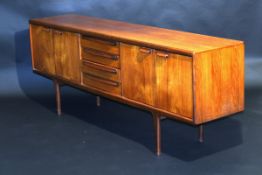 A circa 1980 Danish teak sideboard in the manner of Niels O. Moller, the plain top above four