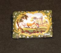 A 19th Century porcelain enamelled brooch of square form depicting a rural landscape with cows and