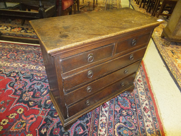 A 19th Century oak miniature chest of two short and three long graduated drawers on bracket feet, - Image 2 of 18