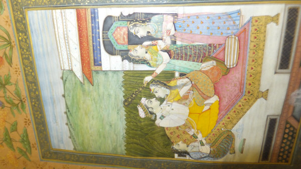 19TH CENTURY MOGHUL SCHOOL "Two lovers on a daybed in a courtyard with attendants", within an - Image 4 of 11