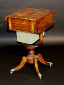 A Regency rosewood and brass inlaid drop leaf Pembroke style work table with end drawer opposite a