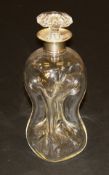 An early 20th Century glass decanter of waisted form with silver collar (by Maxfield & Sons Ltd.,