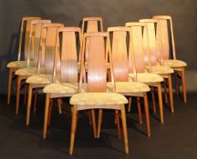 A set of ten circa 1980 Danish "Eva" teak dining chairs, the tapering shaped backs above shaped