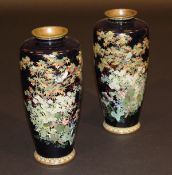 A pair of Meiji-Taisho period Japanese cloisonné vases profusely decorated with finches amongst