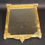 A 19th Century Continental giltwood and gesso framed pier glass, the egg and dart cornice over a