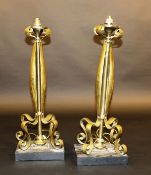 A pair of Birmingham Guild brass table lamps in the Art Nouveau style with heavy black marble bases