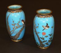 A pair of late 19th/early 20th Century Chinese cloisonné baluster shaped vases depicting finches