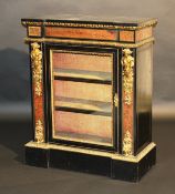 A Victorian ebonised and boulle work decorated side cabinet, the plain top above an egg and dart