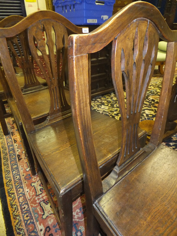A set of eight late 18th Century provincial oak dining chairs, the serpentine top rails above a - Image 14 of 19