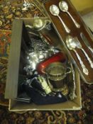 A box containing a Community Plate canteen of cutlery, various other cutlery, bottle coaster, plated